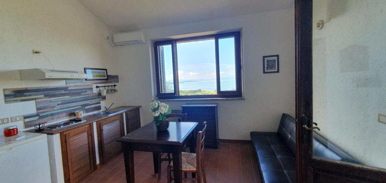 Poloturisticoumbria Rustico Con Piscina Vista Lago Passignano sul Trasimeno Bagian luar foto