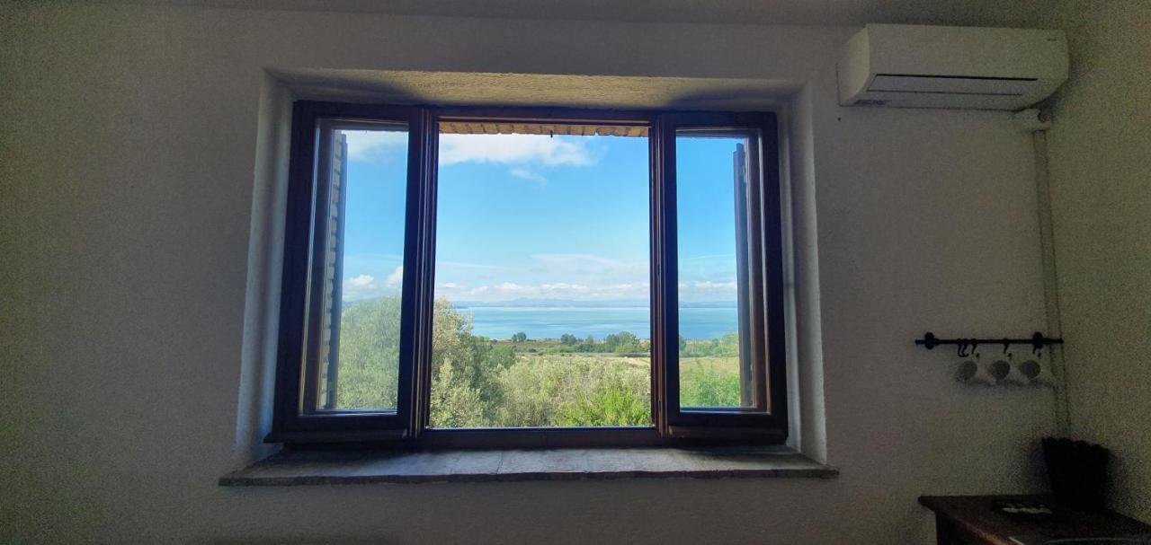 Poloturisticoumbria Rustico Con Piscina Vista Lago Passignano sul Trasimeno Bagian luar foto